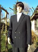 Veste noire croisÃ©e Ã  quatre boutons
