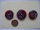 Boutons spirales gris et rouges